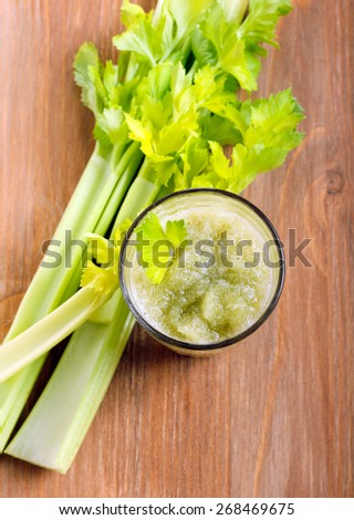 Celery fresh in glass and celery stalks