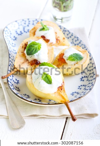 Baked pears with marmalade and minted yogurt