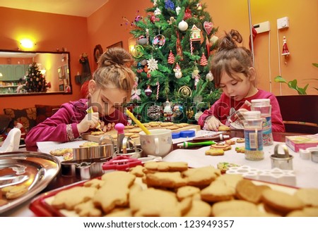 Children make cakes on the Christmas eve