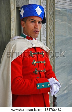 RABAT, MOROCCO - FEBRUARY 09 : Royal guard in front of the mausoleum in Rabat, Morocco. Mausoleum contains tombs of the Moroccan kings, late King Hassan II and Prince Abdallah. February 09, Rabat.