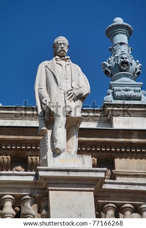 Statue of famous composer on the roof of Opera House in Budapest