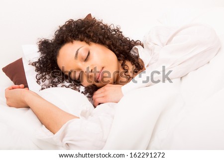 African woman sleeping in bed