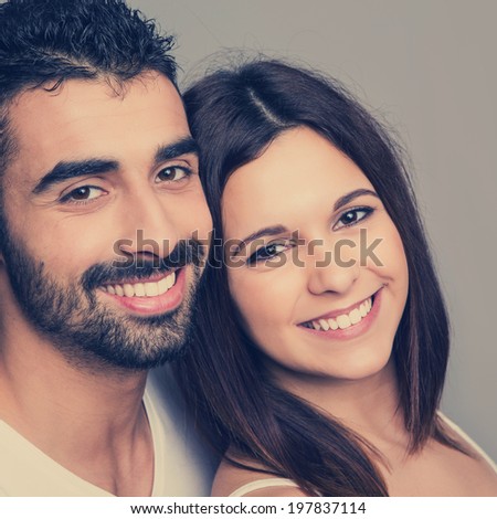 Portrait of a funny love couple hugging each other