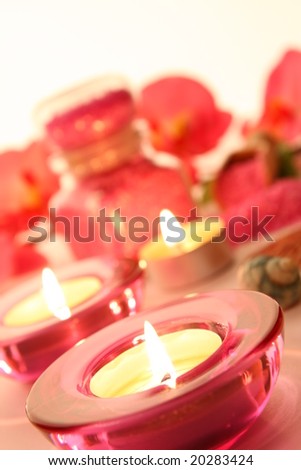 Spa scene with candles, salt and flowers - pink scene
