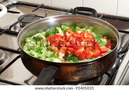 Vegetables in a wok pan