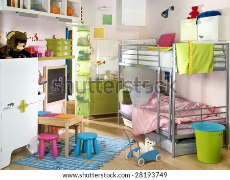 light children room with many toys