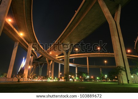 Night landscape: park under Bhumibol, Industrial ring, bridge in Bangkok, Thailand