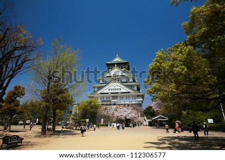 OSAKA-APR 13: Landscape of main entrance with sukura blossom at Osaka castle on April 13, 2011 in Osaka, Japan. Here is one of the most famous castles that tourists all over the world want to visit.