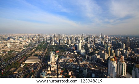 Aerial skyline view of express way and city against blue sky in Bangkok