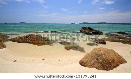 White sand beach with beautiful rock and crystal andaman sea at Koh Khai near Koh Tarutao in Satun, Thailand