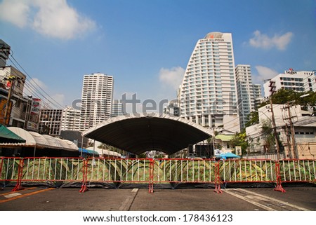 BANGKOK, THAILAND - FEBUARY 19, 2014: Anti-government protest (PDRC, People's Democratic Reform Committee) tent camp set at Rachada road near Asoke intersection, the central business area in Bangkok.