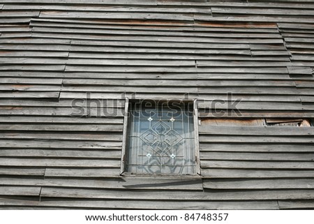 Texture: Old Wooden Wall and Protection Steel Window