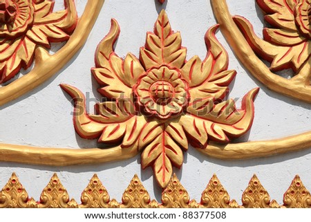 Ornament: Gold metal sculpture of flowers in Thai temple