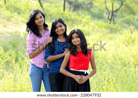 Simple portrait three sisters in outdoor