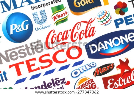 KIEV, UKRAINE - MAY 07, 2015:Collection of popular food logos companies printed on paper:Coca-Cola, Mars, Pepsico, Nestle, Tesco and others