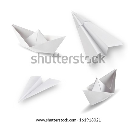 set of paper ships and paper planes on white