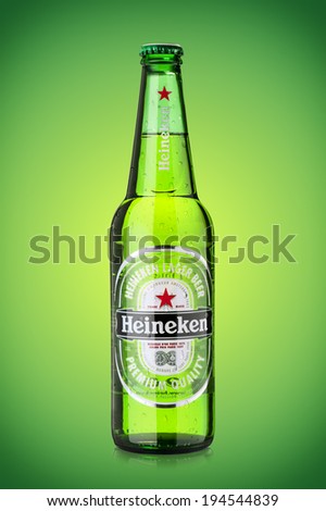 SOFIA, BULGARIA - MAY 23, 2014: Bottle of Heineken beer with water drops on green background.