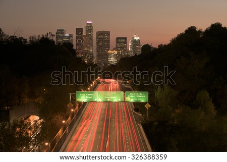 Los Angeles sunset highway traffic skyline