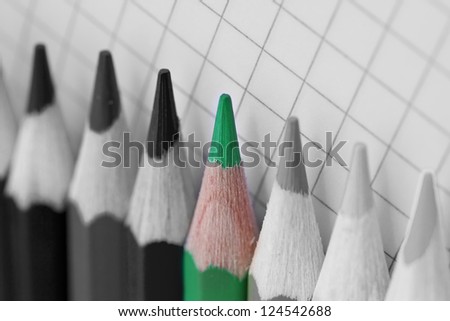 single green pencil in selective coloured image
