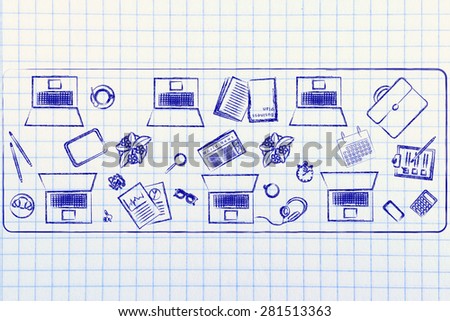organizing and collaborating: laptops and office objects on shared desk