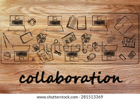organizing and collaborating: laptops and office objects on shared desk