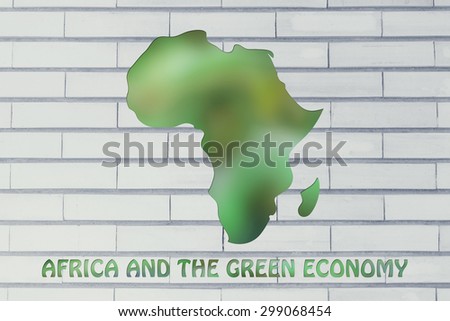 environmental awareness and green economy: illustration with map of africa made of green leaves blur