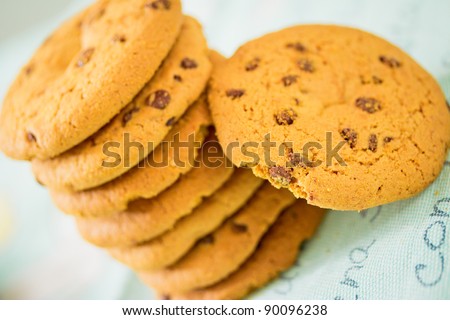 a still-life of a stack of cookies with chocolate chips