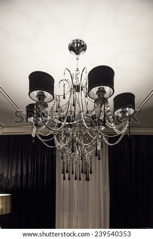 Crystal Chandelier with black shade in the interior