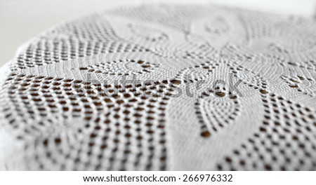 flower symmetrical pattern lace doily close to