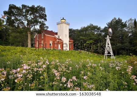 Forty Mile Point Lighthouse wild roses in bloom, Rogers City Michigan