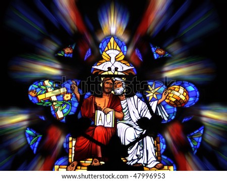 stained-glass panel in the church, father and son is God, pigeon and the cross