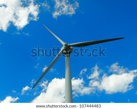 Big windmill in blue sky