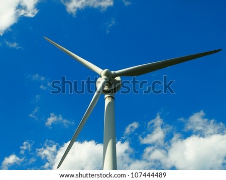 Big windmill in blue sky