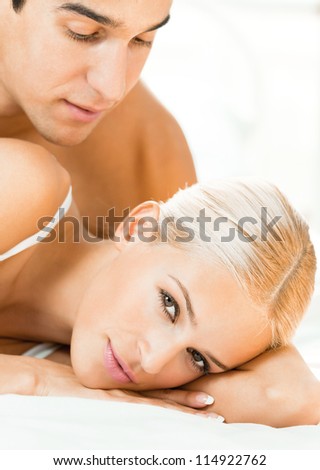 Young attractive couple at bedroom