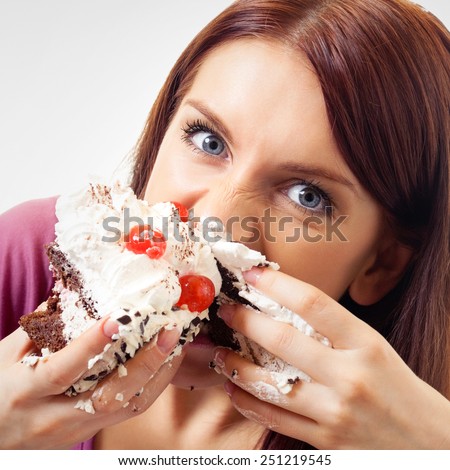 Woman eating pie
