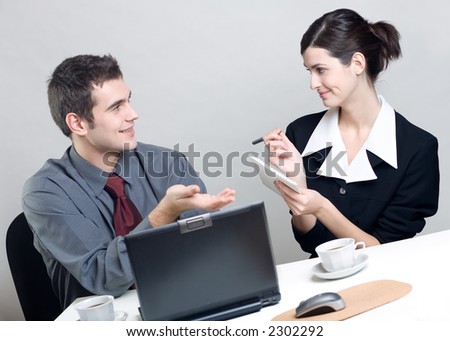 Businessman and businesswoman working at office or young woman interviews man