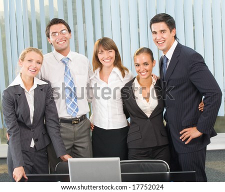 Portrait of happy successful business team at office
