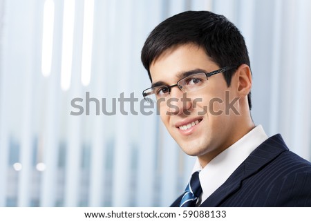 Portrait of successful businessman at office