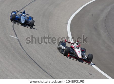 Ft WORTH, TX - JUN 08: Ryan Briscoe (2) and Alex Tagliani (98) prepare to qualify for the Firestone 550 race at the Texas Motor Speedway in Fort Worth, TX on June 08, 2012.