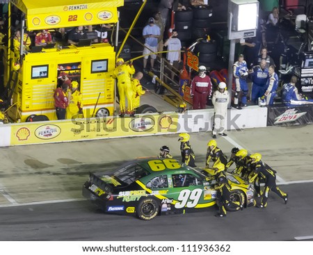 ATLANTA, GA - SEP 02, 2012:  Carl Edwards (99) is pushed back into the garage after his engine blows during the AdvoCare 500 at the Atlanta Motor Speedway in Hampton, GA  on Sep 2, 2012.
