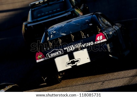 FORT WORTH, TX - NOV 04:  Jimmie Johnson (48) brings his car through turn 1 during the AAA Texas 500 at Texas Motor Speedway in Fort Worth, TX on Nov 4, 2012.