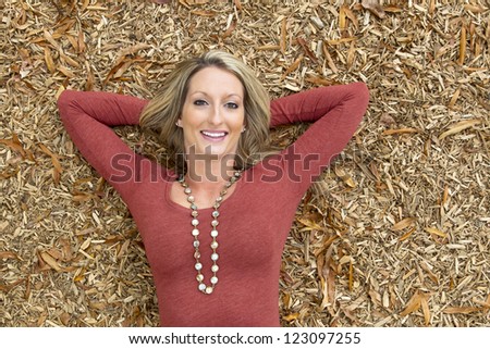 Beautiful woman posing in an outdoor environment