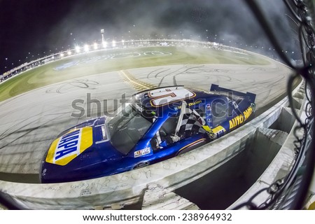 Joliet, IL - Jul 19, 2014:  Chase Elliott (9) takes the checkered flag for the third time this year as he wins the EnjoyIllinois.com 300 at Chicagoland Speedway in Joliet, IL.