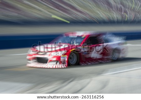 Fontana, CA - Mar 21, 2015:  Kyle Larson (42) takes to the track to practice for the Auto Club 400 at Auto Club Speedway in Fontana, CA.