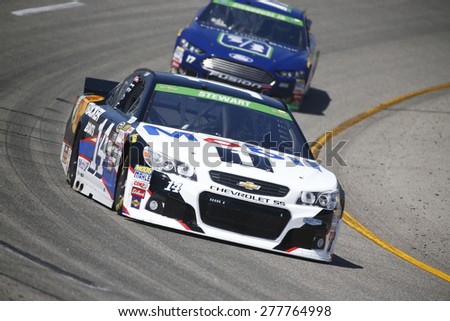 Richmond, VA - Apr 24, 2015:  Tony Stewart (14) brings his race car through the turns during a practice session for the Toyota Owners 400 race at the Richmond International Raceway in Richmond, VA.
