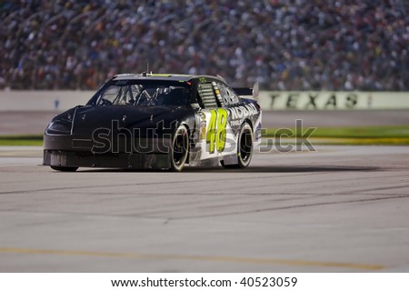 FT. WORTH, TX - 8 NOVEMBER:    Jimmie Johnson brings his crashed Lowe\'s Chevrolet back on the track at the Dickies 500 race on November 8, 2009 at the Texas Motor Speedway in Ft. Worth, TX.