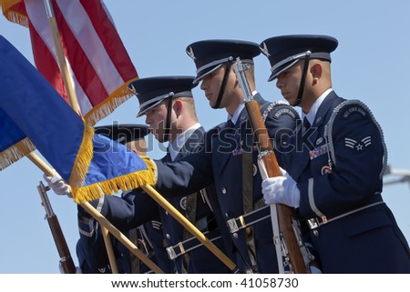 AVONDALE, AZ - NOV 15: The US Air Force Color Guard presents the colors before the Checker O\'Reilly Auto Parts 500 race at the PIR on November 15, 2009 in Avondale, AZ.
