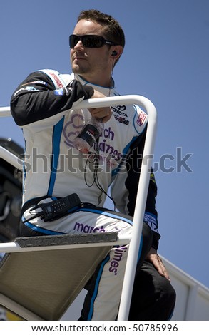AVONDALE, AZ - APRIL 09:  Casey Mears, Denny Hamlin\'s potential replacement driver, sits on top of the hauler during the running of the Subway Fresh Fit 600 race on April 09, 2010 in Avondale, AZ.