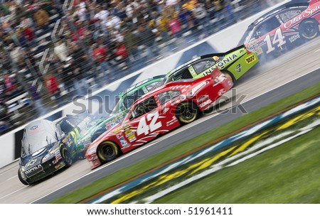 FORT WORTH, TX - APR 19:  A multiple car wreck brings out a red flag at Texas Motor Speedway during the running of the Samsung Mobile 500 race Apr 16, 2010 in Fort Worth, TX.