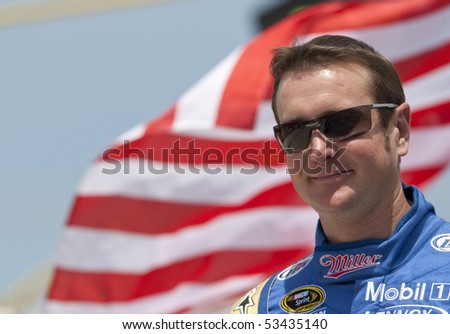 DOVER, DE - May 16:  Kurt Busch heads to his car at the Dover International Speedway for the Autism Speaks 400 presented by Hershey\'s Milk & Milkshakes on May 16, 2010 in Dover, DE
